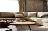 Luxurious living room with a large sectional sofa, perfect for relaxing and entertaining.