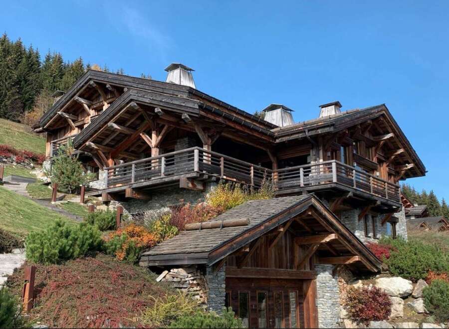 This stunning chalet boasts exquisite craftsmanship, with exposed wooden beams and stonework creating a warm and inviting atmosphere.