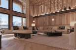 Luxury chalet with breathtaking mountain views and expansive windows.