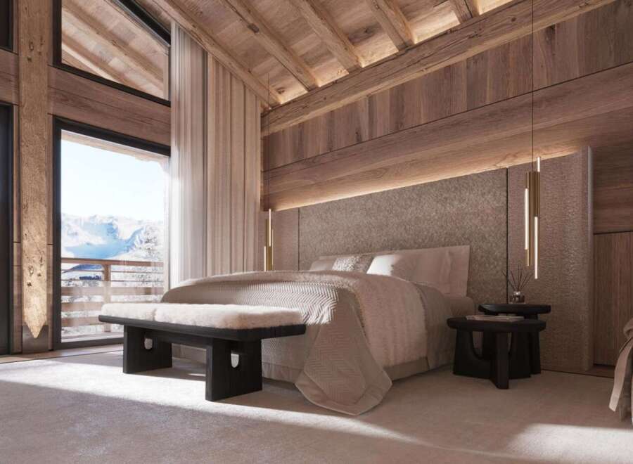 Luxurious chalet bedroom with stunning mountain views.