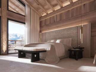 Luxurious chalet bedroom with stunning mountain views.