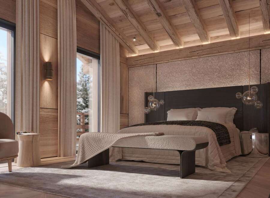 Luxurious chalet bedroom with stunning mountain views.
