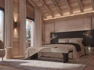 Luxurious chalet bedroom with stunning mountain views.