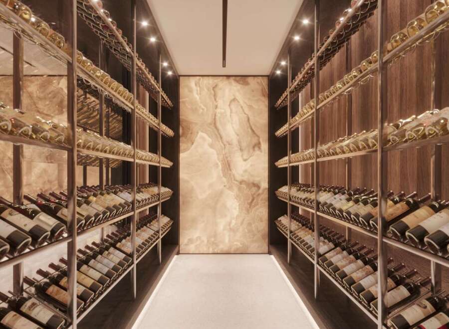 This luxurious property boasts a stunning, temperature-controlled wine cellar, showcasing an extensive collection of fine wines.