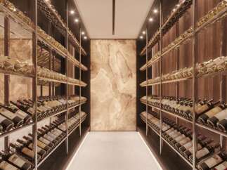 This luxurious property boasts a stunning, temperature-controlled wine cellar, showcasing an extensive collection of fine wines.