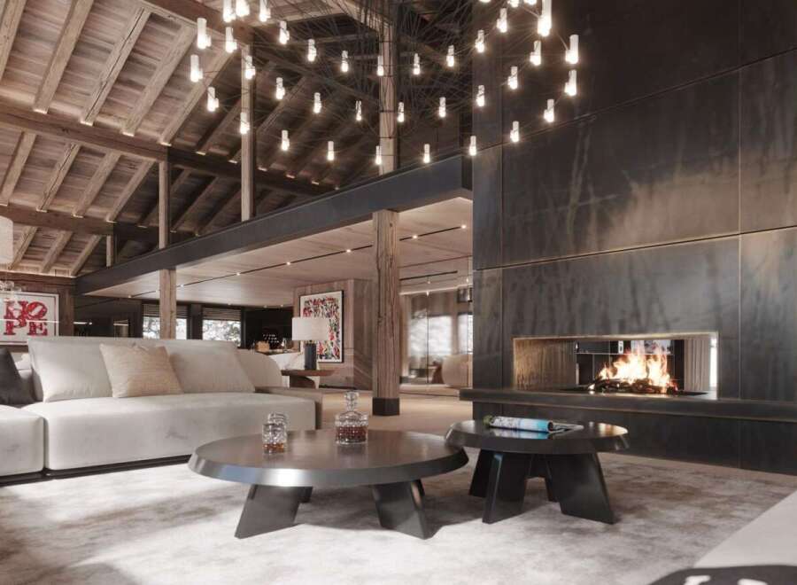 Luxury chalet with stunning wooden beams and a large metal fireplace.