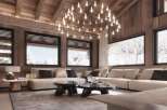 Luxurious chalet with stunning mountain views and a spacious open-plan living area.