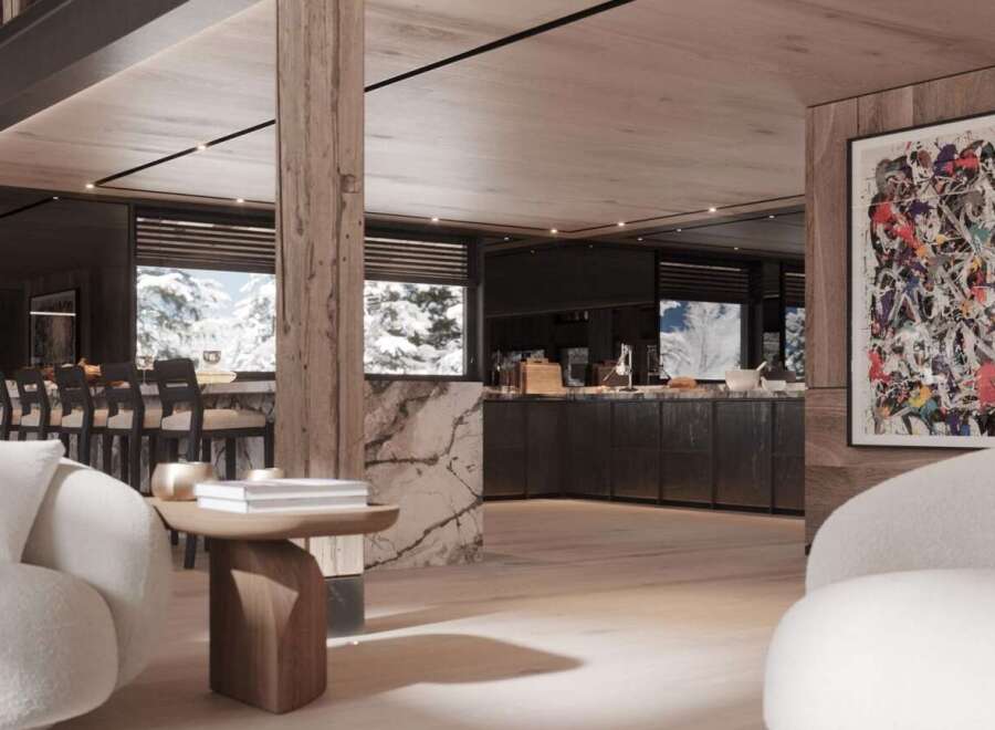 This luxurious chalet boasts a stunning open-plan living area with floor-to-ceiling windows offering breathtaking mountain views.