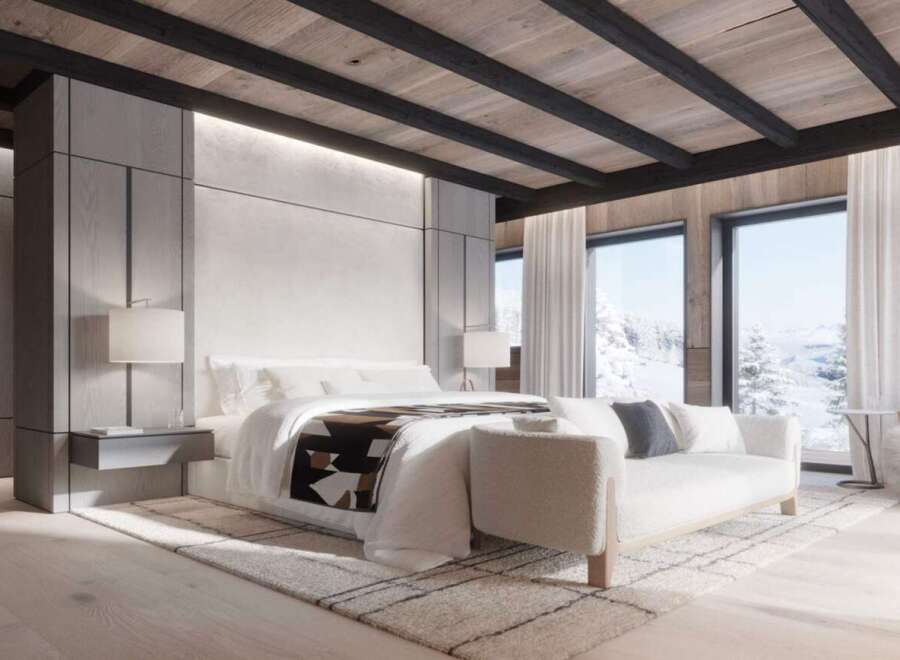 Luxurious mountain retreat boasting a stunning master bedroom with breathtaking views.