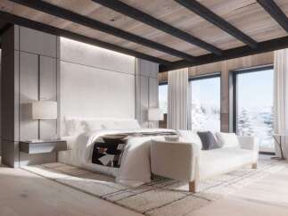 Luxurious mountain retreat boasting a stunning master bedroom with breathtaking views.