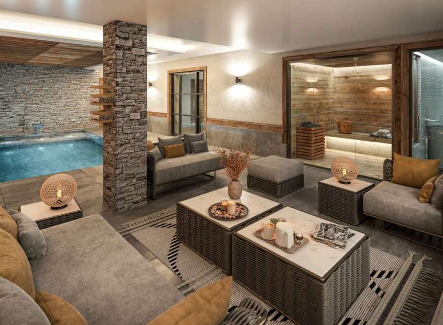 Luxurious chalet featuring a stunning indoor pool and spa area.