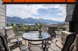 Enjoy breathtaking mountain and lake views from this stunning balcony.