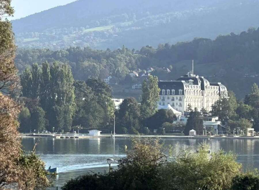 Luxury lakeside hotel nestled in the French Alps.