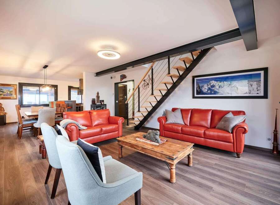 Stunning mountain views greet you from this luxurious chalet featuring a spacious open-plan living area.