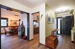 This stunning property boasts a spacious open-plan living area with hardwood floors and a modern kitchen.
