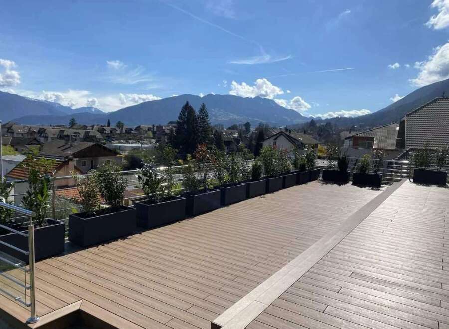 Stunning mountain views from this rooftop deck.