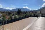 Stunning mountain views from this rooftop deck.