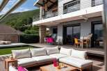Luxury waterfront property with stunning outdoor living space.