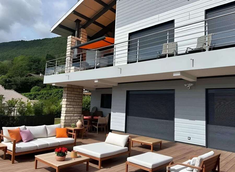 Luxury mountain home with stunning views and spacious outdoor deck.