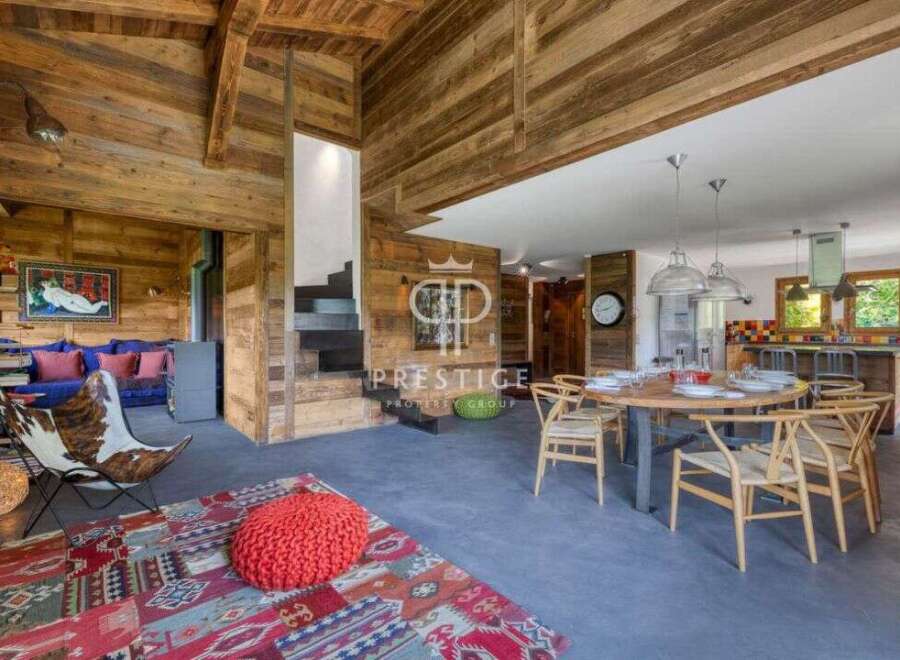 Experience rustic elegance in this stunning property, featuring exquisite wooden accents throughout.