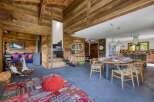 Experience rustic elegance in this stunning property, featuring exquisite wooden accents throughout.