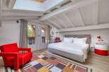 Discover a cozy bedroom retreat with a unique design.