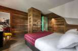 Experience rustic charm in this stunning property, featuring beautiful wooden walls and a cozy atmosphere.
