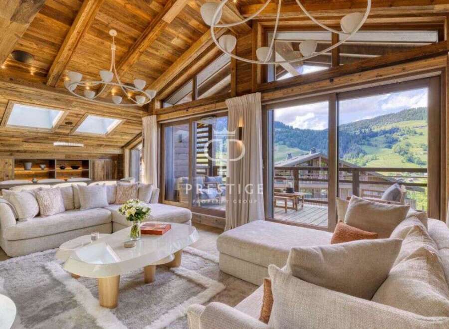 Experience luxury living in this stunning property, featuring a cozy living room with a fireplace and a breathtaking view.
