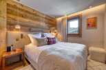 Experience luxury in this stunning bedroom.