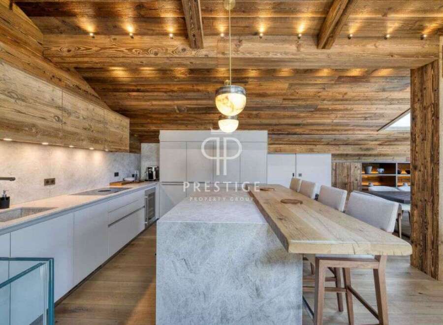 Experience luxury living in this stunning property featuring a beautifully designed kitchen with modern appliances and sleek countertops.