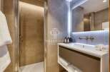 Discover luxury living in this stunning property! Featuring a modern bathroom with sleek design and high-end finishes.