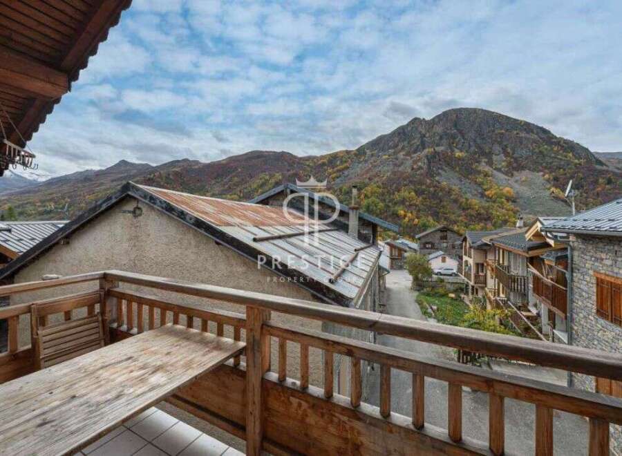 Enjoy breathtaking mountain views from this charming property.