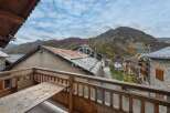 Enjoy breathtaking mountain views from this charming property.