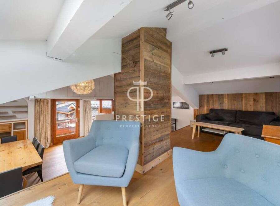 Discover the charm of this stunning property, featuring a cozy living area with a modern design.