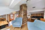 Discover the charm of this stunning property, featuring a cozy living area with a modern design.