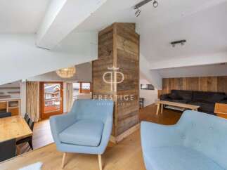 Discover the charm of this stunning property, featuring a cozy living area with a modern design.