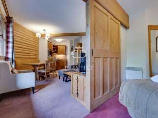 Discover a cozy retreat with this charming property.