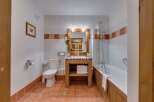 Discover a charming bathroom with a rustic touch.