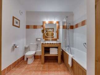 Discover a charming bathroom with a rustic touch.