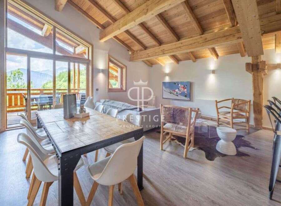 Experience luxury living in this stunning property, boasting a spacious dining area perfect for entertaining.