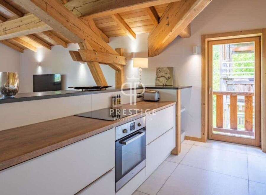 Discover the charm of this stunning property, featuring a beautifully designed kitchen with modern appliances and a warm, inviting atmosphere.