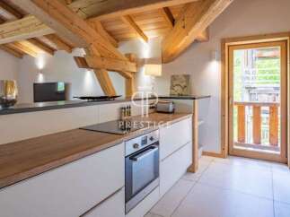 Discover the charm of this stunning property, featuring a beautifully designed kitchen with modern appliances and a warm, inviting atmosphere.