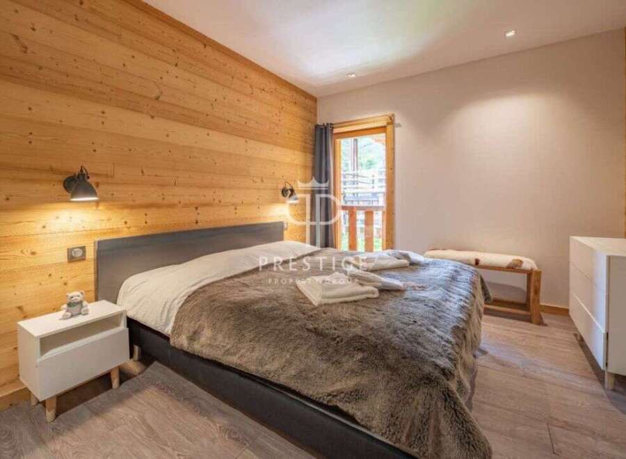 Discover the epitome of comfort in this stunning bedroom.