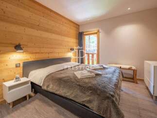 Discover the epitome of comfort in this stunning bedroom.
