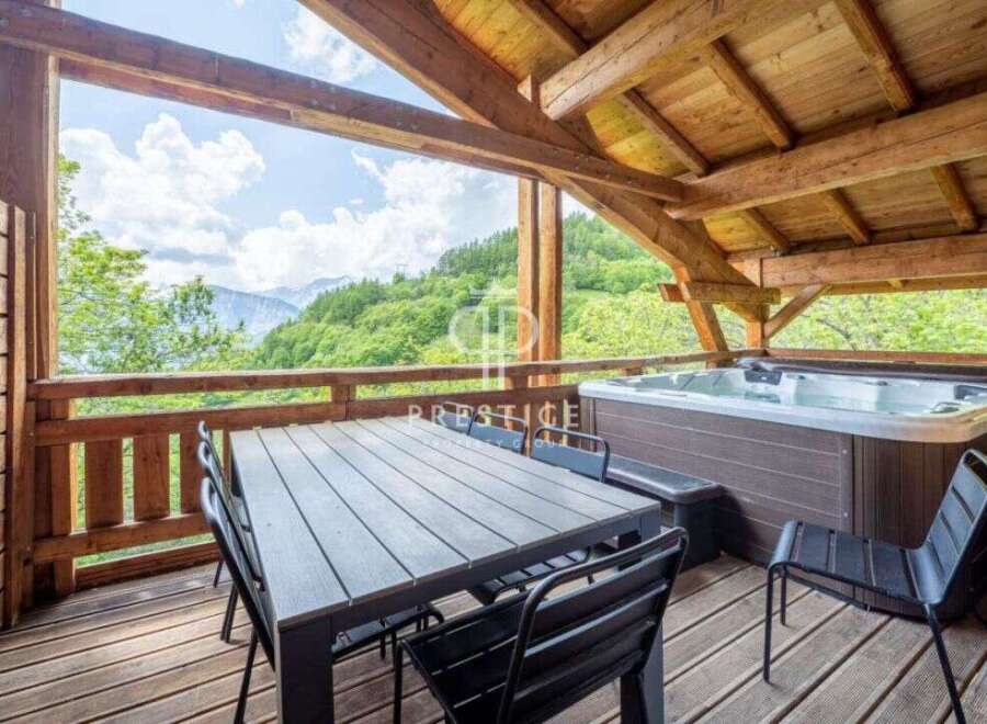 Escape to your mountain retreat! This stunning property boasts a private hot tub and a spacious deck, perfect for relaxation.