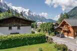 Discover a charming property nestled in a picturesque mountain setting.