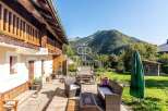 Discover the charm of this stunning property, featuring a beautiful wooden deck perfect for outdoor relaxation.