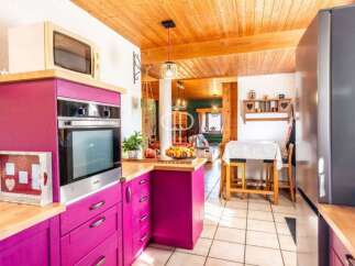 Discover the charm of this unique property! Featuring a vibrant kitchen with modern appliances and a cozy dining area, perfect for everyday living.