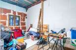 Discover the potential of this property! This space offers a blank canvas for your vision.