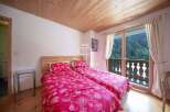Discover a cozy bedroom with a stunning view.